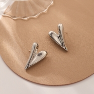 Trendy dimentional heart earring Rhoudium color 