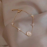 Star with shell and crystal paved bracelet